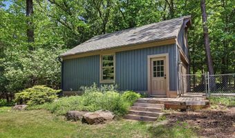 385 Greentree Ln NE, Ada, MI 49301