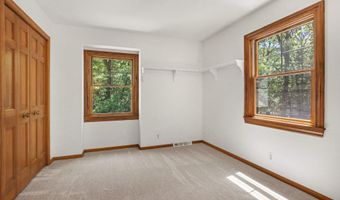 385 Greentree Ln NE, Ada, MI 49301