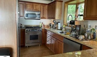 11282 SE Torch Lake Dr, Alden, MI 49612