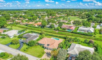 524 Muirfield Dr, Atlantis, FL 33462