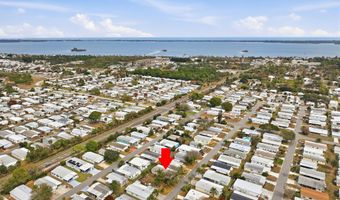 566 Dolphin Cir, Barefoot Bay, FL 32976