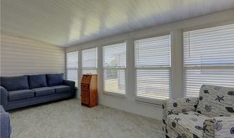 561 Dolphin Cir, Barefoot Bay, FL 32976