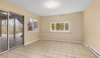 7721 Sun Quest Ridge Dr NE, Ada, MI 49301