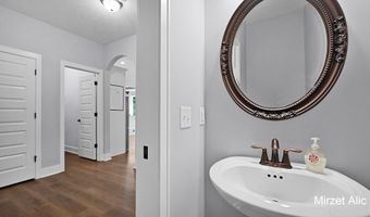 5220 Canyon River Dr NE, Ada, MI 49301