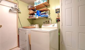 711 Amaryllis Dr, Barefoot Bay, FL 32976