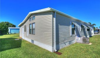 561 Dolphin Cir, Barefoot Bay, FL 32976