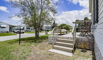 818 Thrush Cir, Barefoot Bay, FL 32976