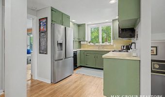 665 Honey Creek Ave NE, Ada, MI 49301