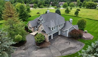 5327 Canyon River Dr NE, Ada, MI 49301