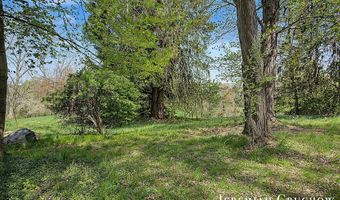 8721 Conservation St NE, Ada, MI 49301
