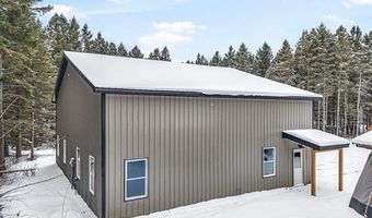 8074 Grosbeak Dr NW, Alden, MI 49612