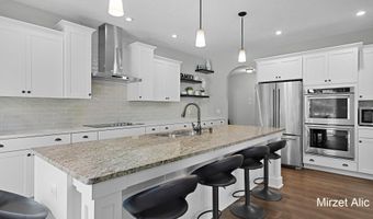 5220 Canyon River Dr NE, Ada, MI 49301