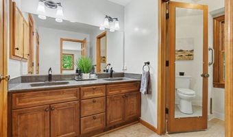 385 Greentree Ln NE, Ada, MI 49301