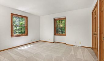 385 Greentree Ln NE, Ada, MI 49301