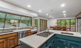 410 Greentree Ln NE, Ada, MI 49301