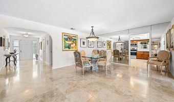 489 S Country Club Dr, Atlantis, FL 33462