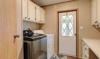 561 Dolphin Cir, Barefoot Bay, FL 32976