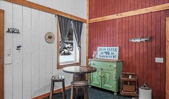 8074 Grosbeak Dr NW, Alden, MI 49612