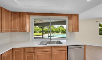 524 Muirfield Dr, Atlantis, FL 33462