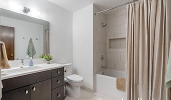 410 Greentree Ln NE, Ada, MI 49301