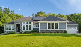 5220 Canyon River Dr NE, Ada, MI 49301