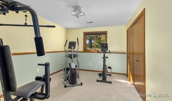 2264 Grand Valley Dr NE, Ada, MI 49301