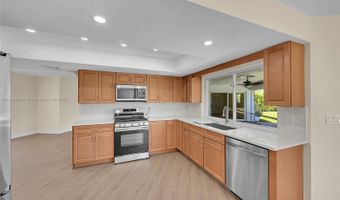 524 Muirfield Dr, Atlantis, FL 33462