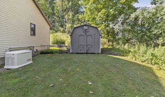 86 Carl Dr NE, Ada, MI 49301