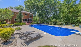 5254 Canyon River Dr NE, Ada, MI 49301