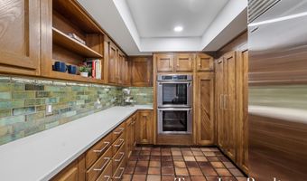 410 Greentree Ln NE, Ada, MI 49301