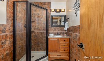 2264 Grand Valley Dr NE, Ada, MI 49301