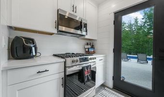 7683 HERENDEENE Trl, Almira, MI 49650