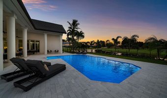 100 Glenbrook Ct, Atlantis, FL 33462