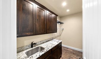 1009 Bluebonnet Ln, Adkins, TX 78101