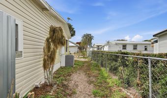 566 Dolphin Cir, Barefoot Bay, FL 32976