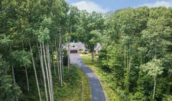 259 Grand River Dr NE, Ada, MI 49301
