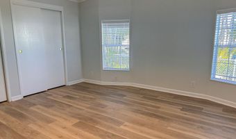 606 Dolphin Cir, Barefoot Bay, FL 32976