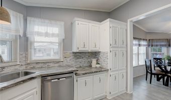 572 Dolphin Cir, Barefoot Bay, FL 32976