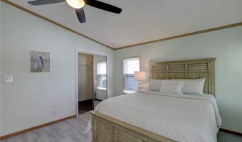 572 Dolphin Cir, Barefoot Bay, FL 32976