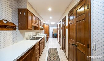 550 Greentree Ln NE, Ada, MI 49301
