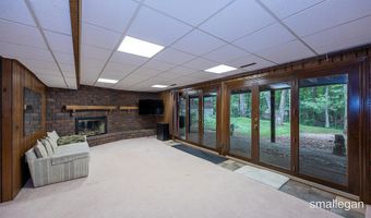 550 Greentree Ln NE, Ada, MI 49301