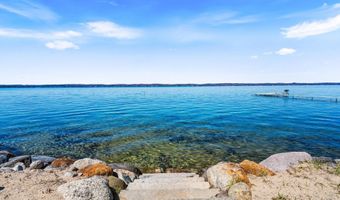 11256 SE Torch Lake Dr, Alden, MI 49612