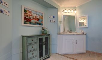 572 Dolphin Cir, Barefoot Bay, FL 32976