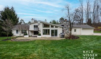 589 Grand River Dr NE, Ada, MI 49301