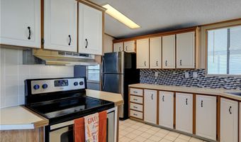 561 Dolphin Cir, Barefoot Bay, FL 32976