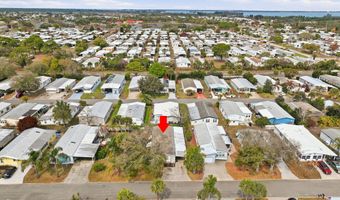 566 Dolphin Cir, Barefoot Bay, FL 32976