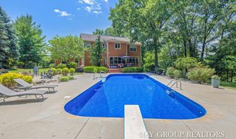 5254 Canyon River Dr NE, Ada, MI 49301