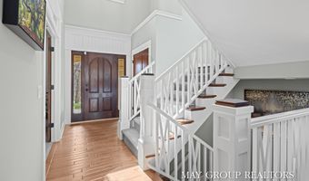 5254 Canyon River Dr NE, Ada, MI 49301
