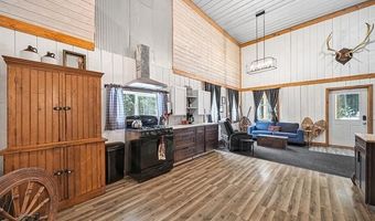 8074 Grosbeak Dr NW, Alden, MI 49612