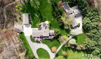 589 Grand River Dr NE, Ada, MI 49301